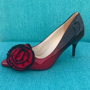 Red Patent Pointed-Toe Pumps with Decorative Rosette